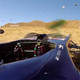 Image for article titled Watch awesome Tom Cruise drive awesome F1 car awesomely